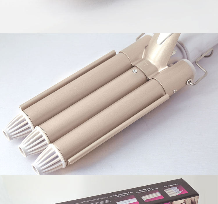 KM-1010 Kemei three stick curling iron does not hurt power generation roll bar water corrugated plywood egg roll big volume perm