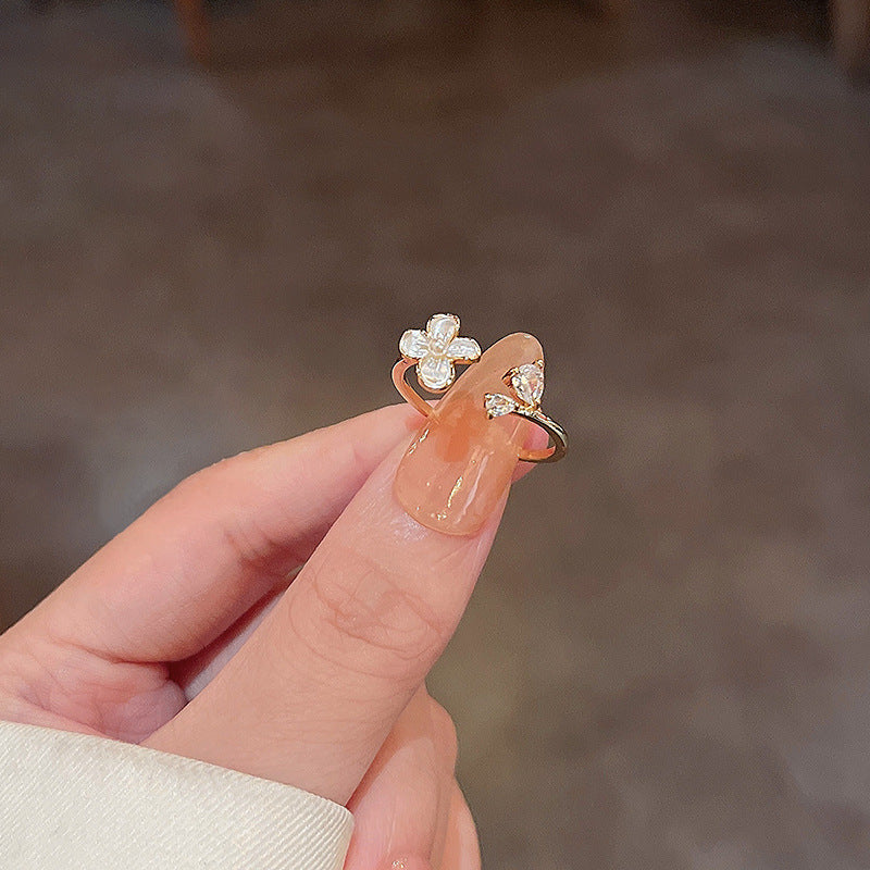 Light luxury high-end design pearl ring female niche ins style exquisite zircon ring open ring hand jewelry