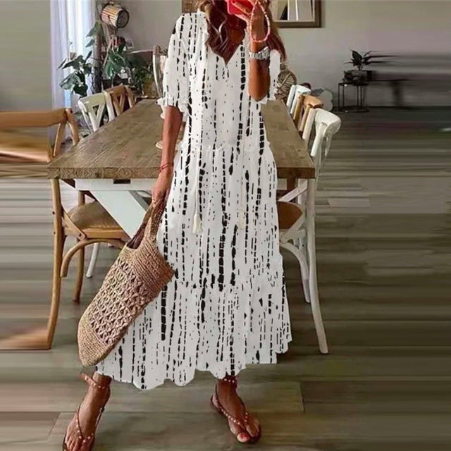 Cross-border European and American spring and summer new women's long-sleeved dress with tassels loose bohemian print V-neck dress